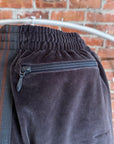 NEEDLES HD TRACK PANTS ‘DARK GRAY/COPPER’