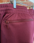 NEEDLES WIDE HD TRACK PANTS ‘MAROON/PURPLE’
