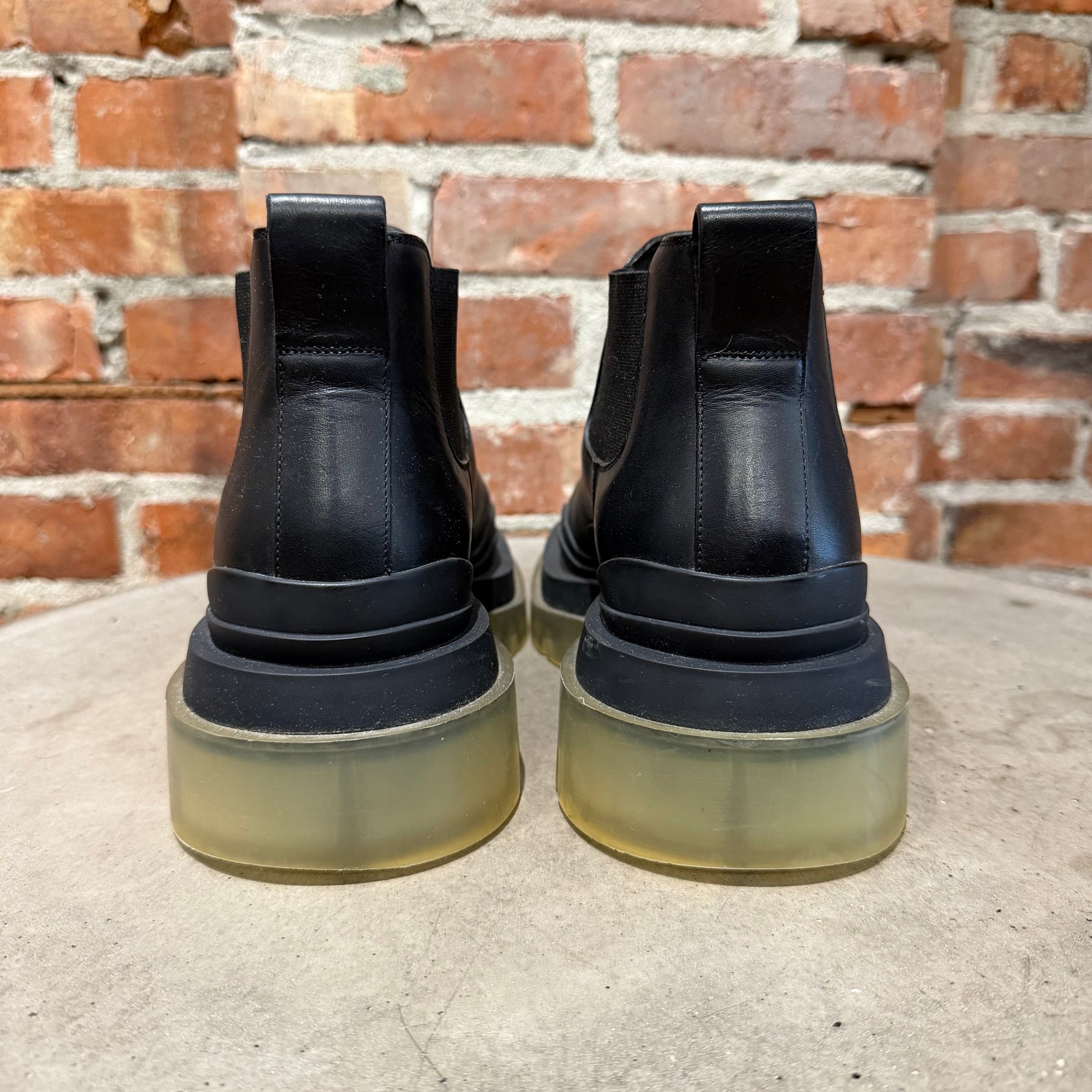 BOTTEGA VENETA TIRE LUG BOOTS ‘BLACK/TRANSLUCENT’