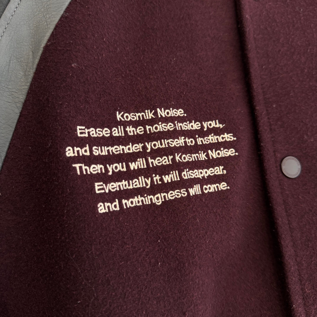 GU X UNDERCOVER KOSMIK NOISE VARSITY JACKET ‘BLACK/MAROON’