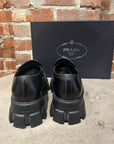 PRADA LEATHER MONOLITH LOAFERS ‘BLACK’