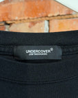 UNDERCOVER FIGHT WAR NOT WARS TEE ‘BLACK’
