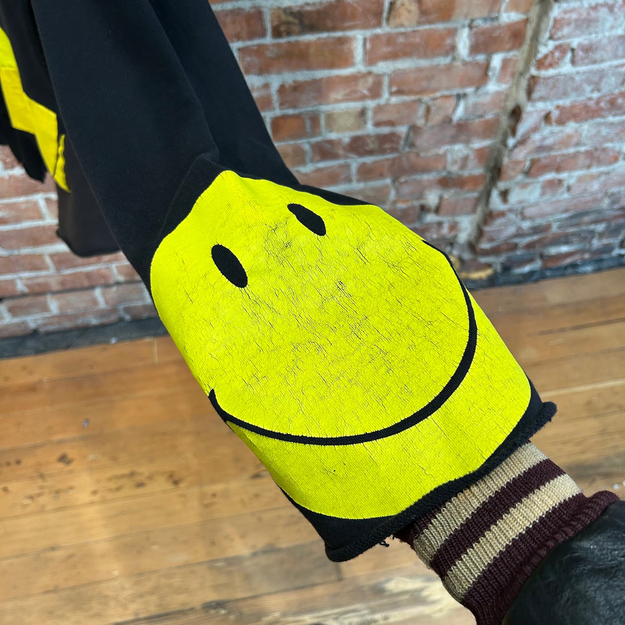 KAPITAL RECONSTRUCTED PATCHWORK SMILEY HOODIE ‘BLACK/YELLOW’