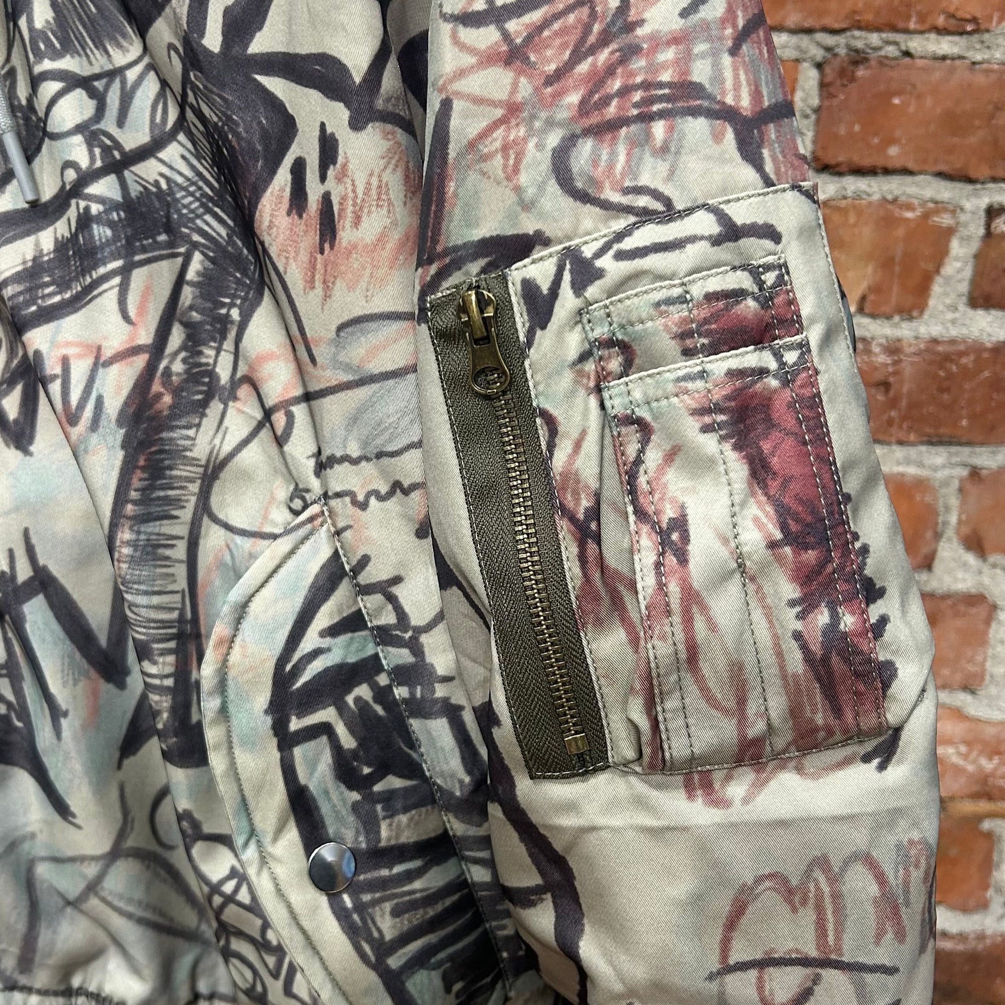 MOWALOLA HYBRID GRAFFITI HOODED BOMBER ‘SAGE’