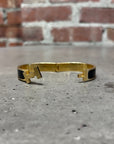 HERMES CLICK BRACELET ‘GOLD/BLACK’