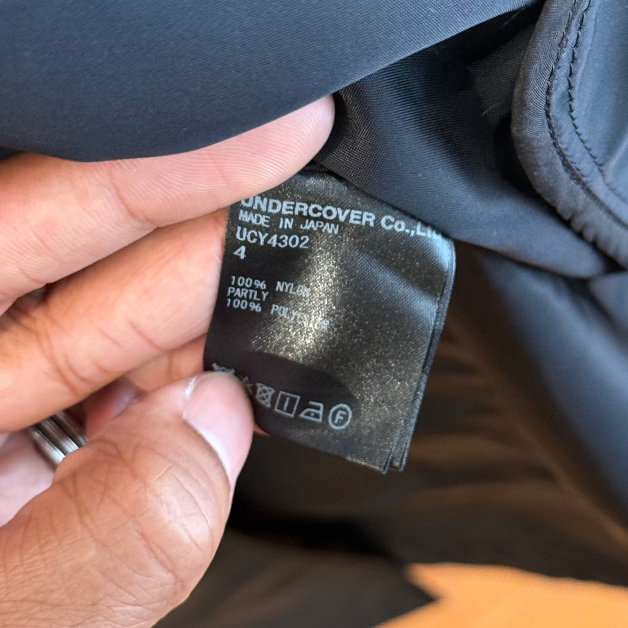 UNDERCOVER SS20 CINDY SHERMAN DOUBLE BREASTED TRENCH COAT ‘BLACK’