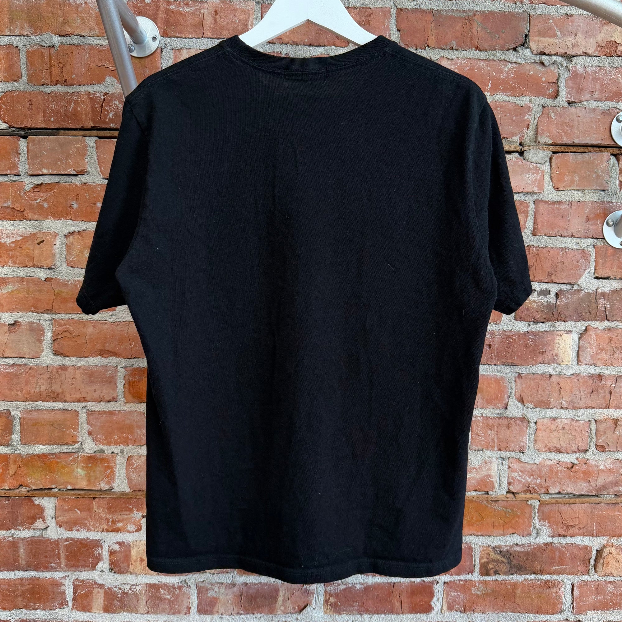 UNDERCOVER MADSTORE WE MAKE NOISE NOT CLOTHES TEE ‘BLACK’