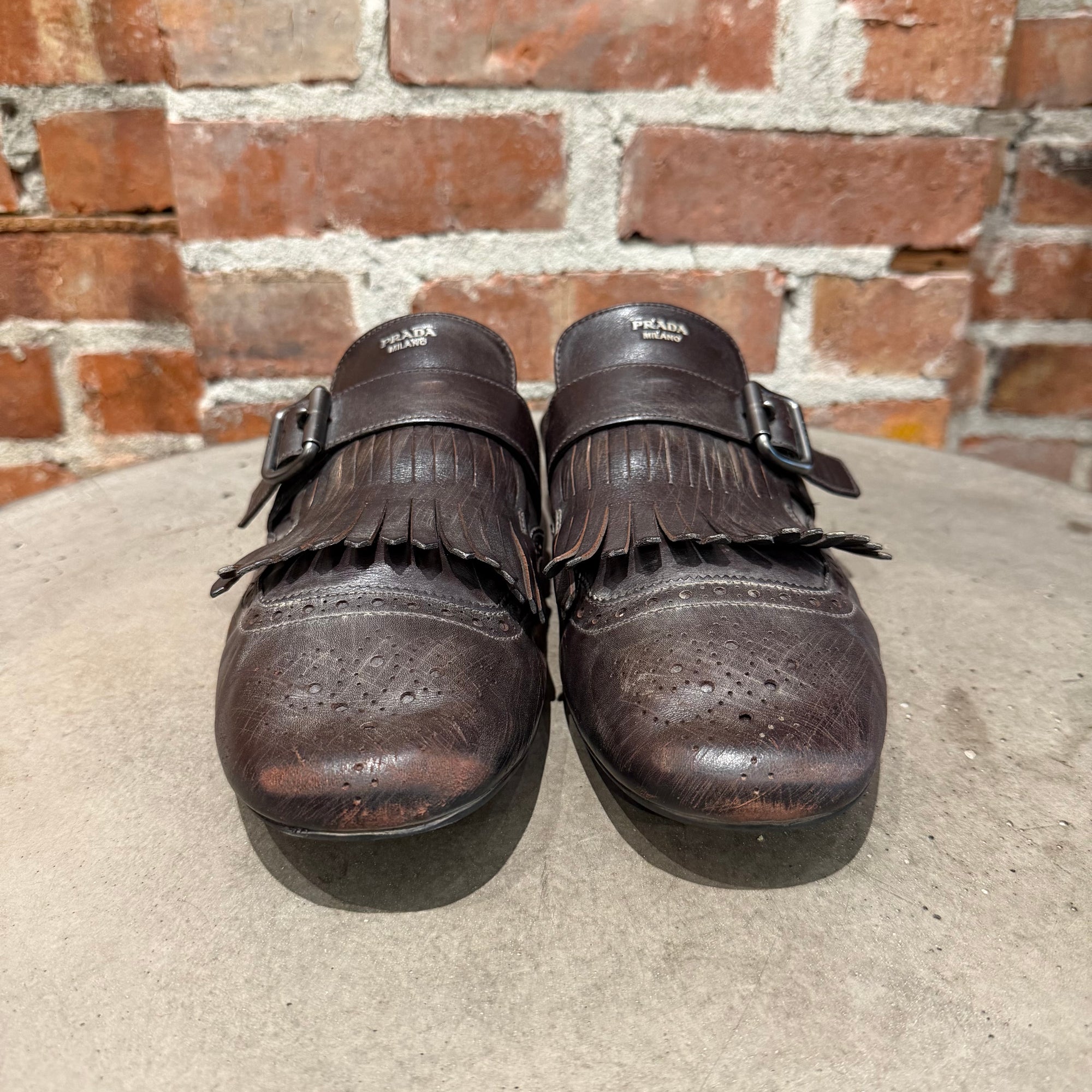 PRADA SS25 FRINGED MONK STRAP SHUFFLE LOAFERS ‘BROWN’