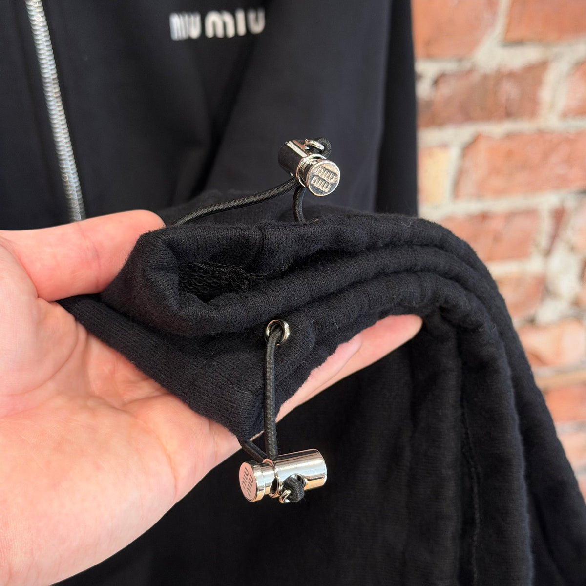 MIU MIU FW25 COTTON FLEECE QUARTER ZIP ‘BLACK’