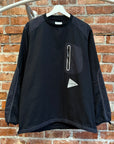 AND WANDER LIGHT POLYESTER PULLOVER ‘BLACK’