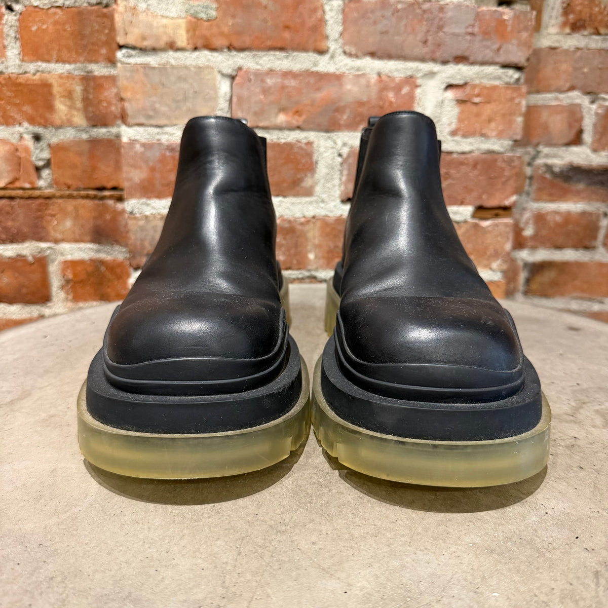 BOTTEGA VENETA TIRE LUG BOOTS ‘BLACK/TRANSLUCENT’