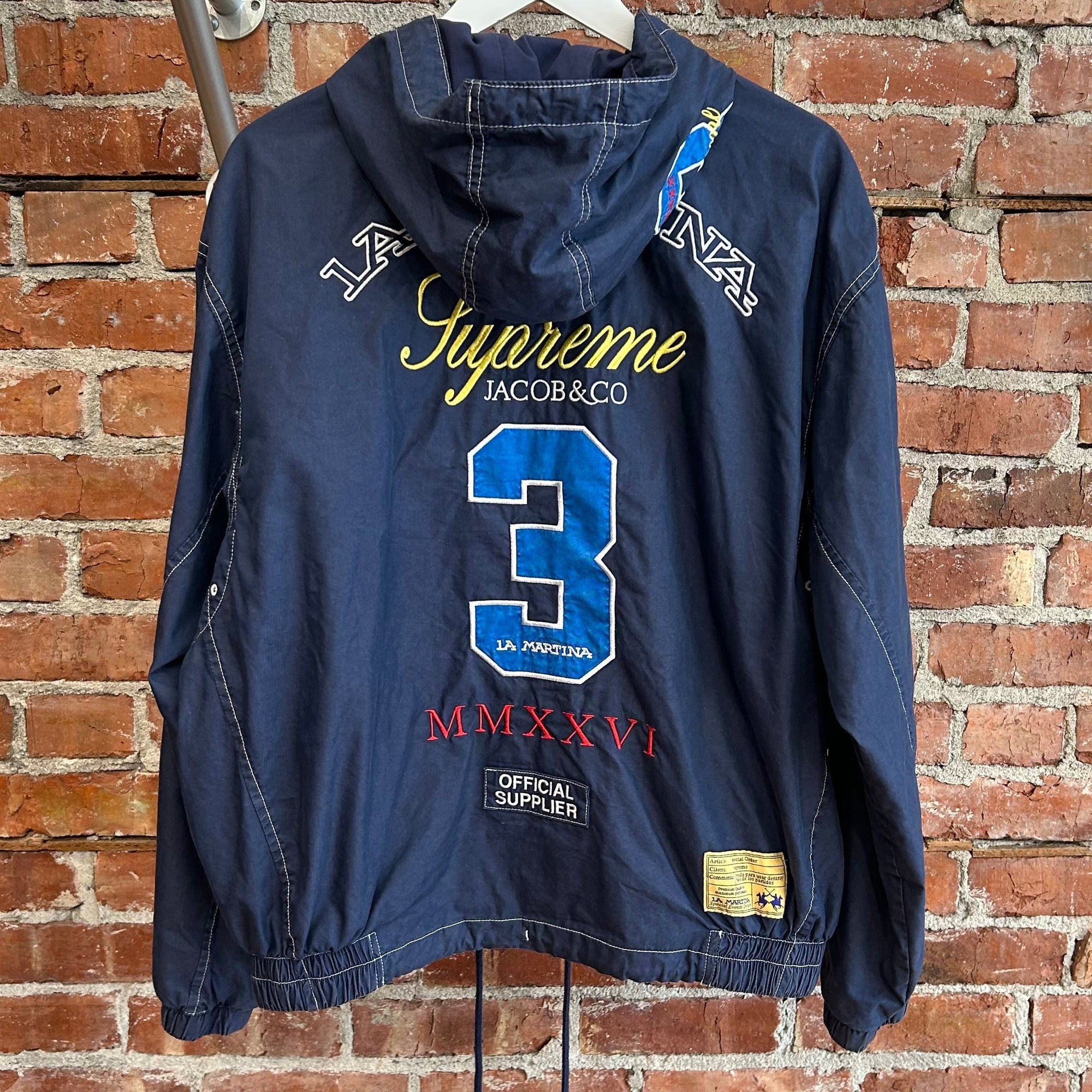 SUPREME X JACOB &amp; CO X LA MARTINA SS26 HOODED JACKET ‘NAVY’