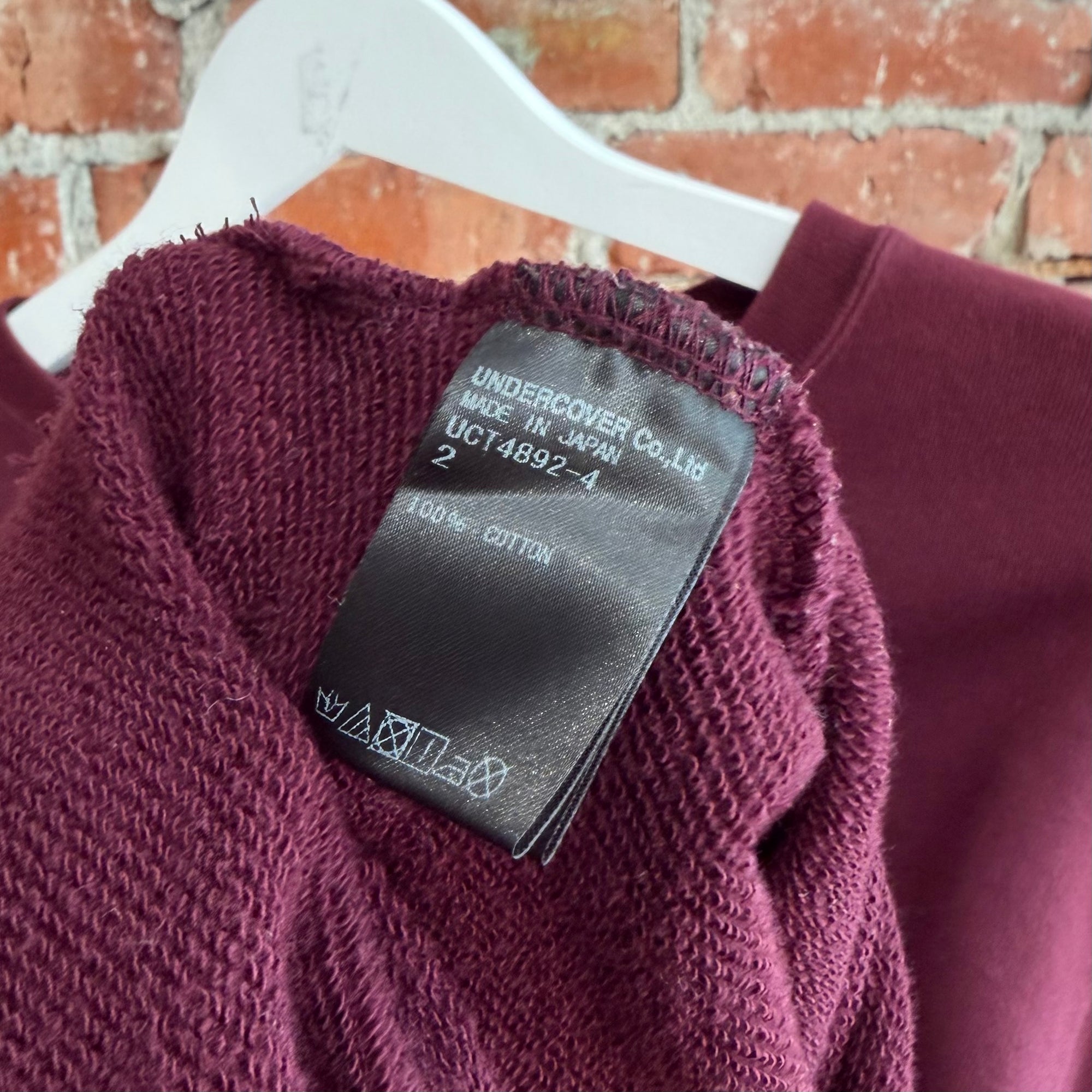 UNDERCOVER AW17 "BRAINWASHED GENERATION" MEDIA IS GOD CREWNECK ‘MAROON’