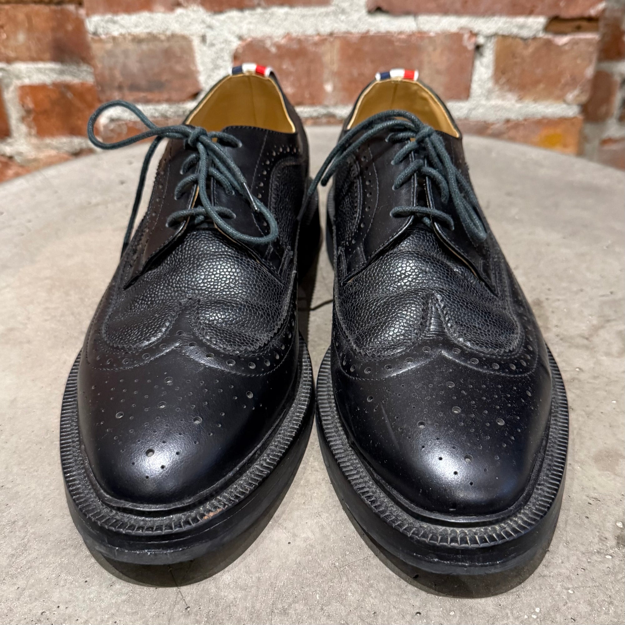THOM BROWNE PEBBLE-GRAIN LONGWING BROGUES ‘BLACK’
