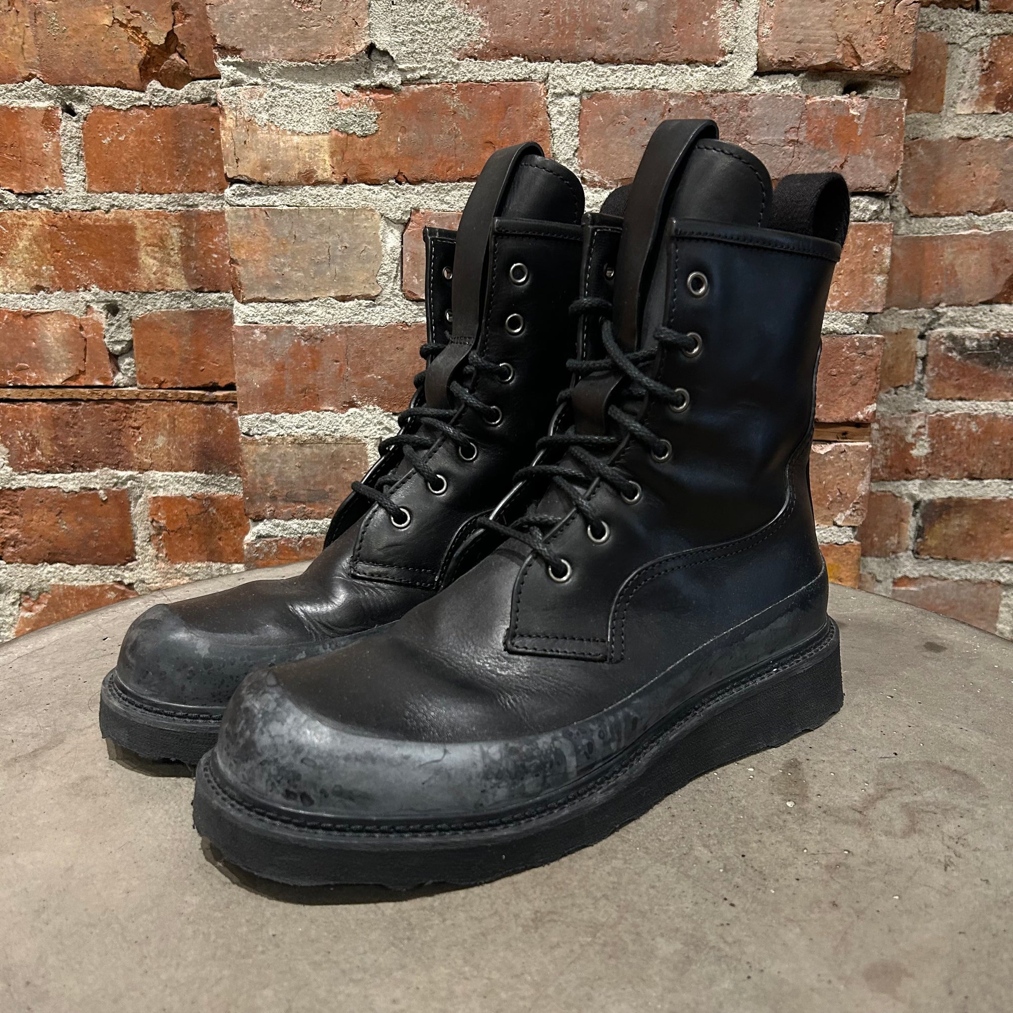 BOTTEGA VENETA STORM CUIR COMBAT BOOTS ‘BLACK’
