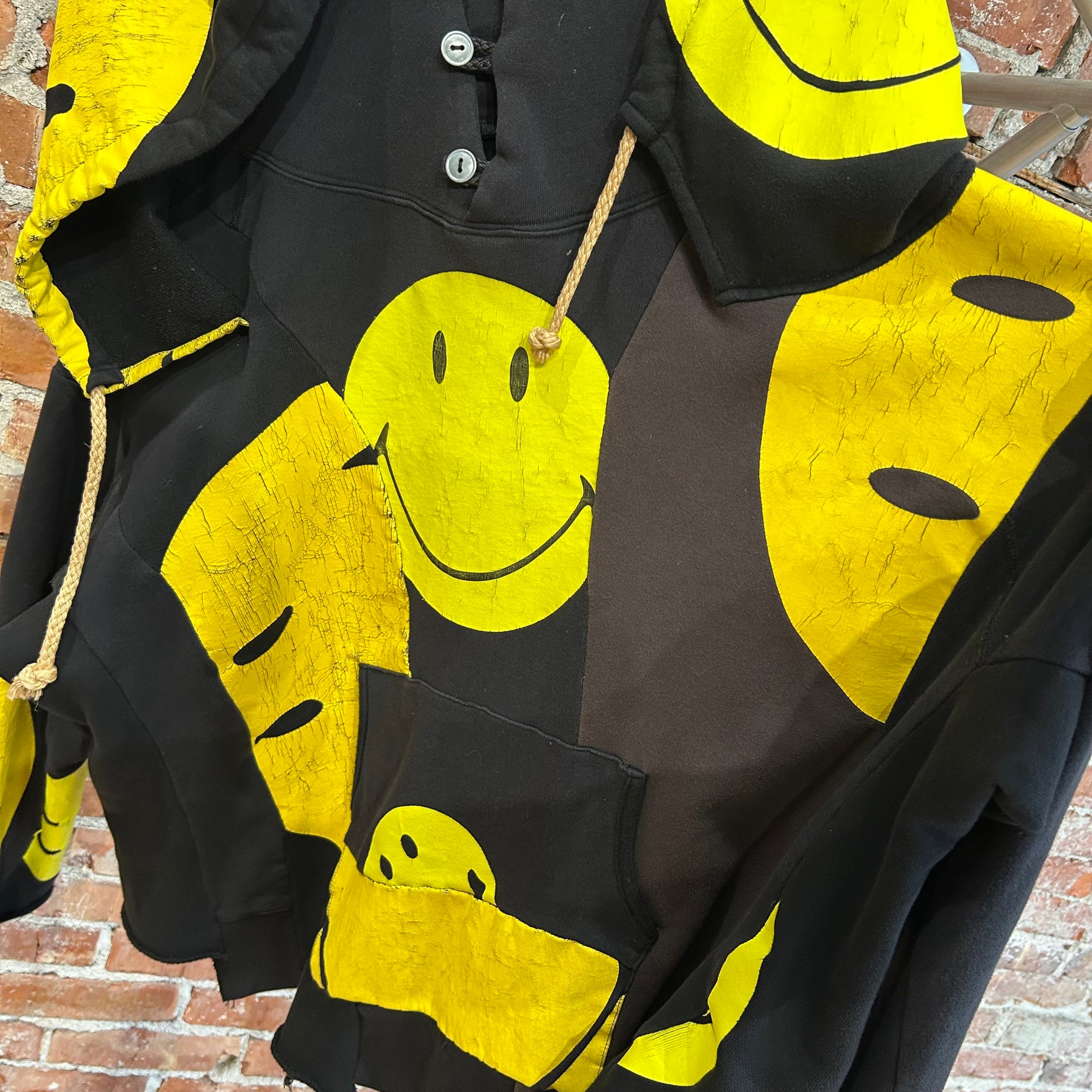 KAPITAL RECONSTRUCTED PATCHWORK SMILEY HOODIE ‘BLACK/YELLOW’