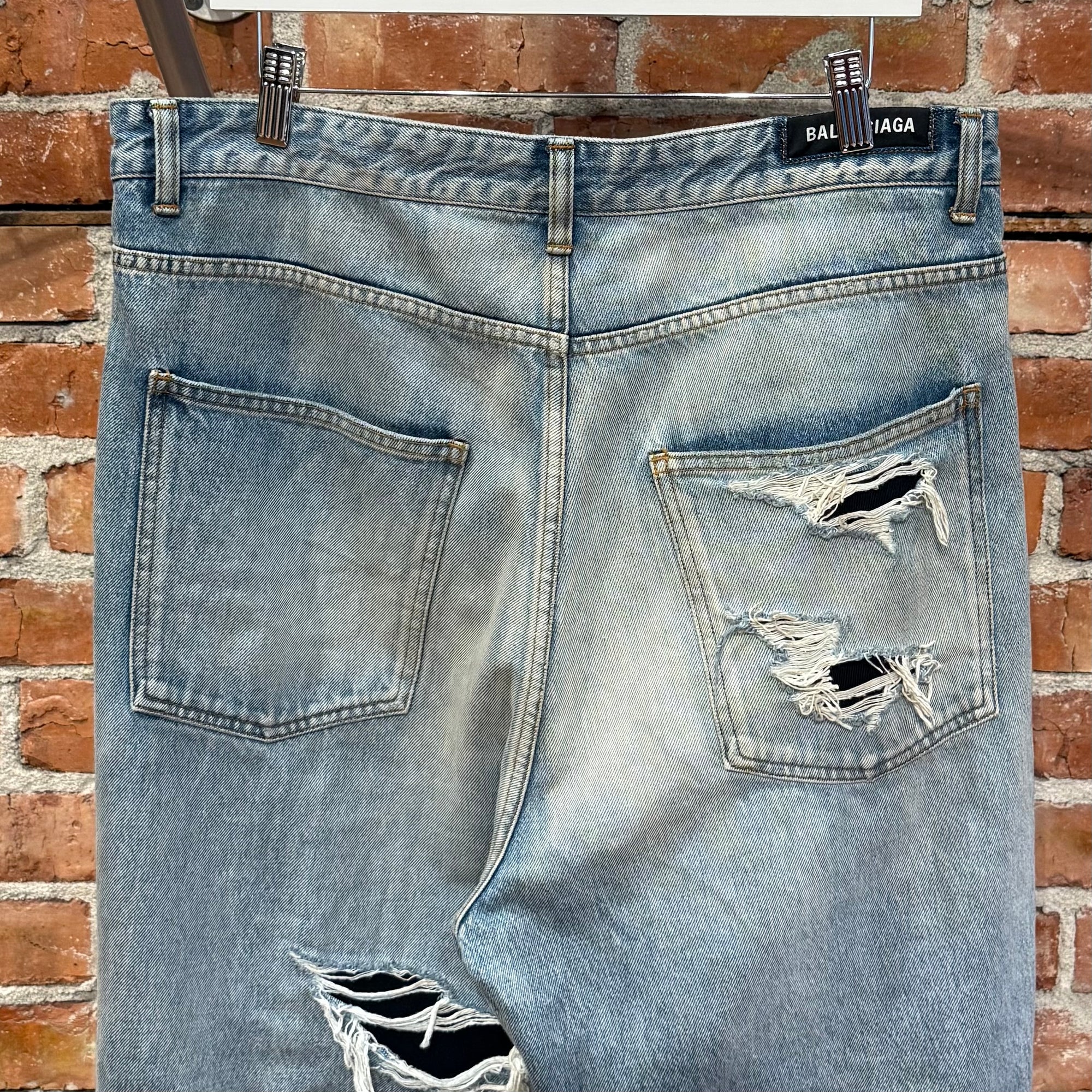 BALENCIAGA DOUBLE LAYERED DISTRESSED LOGO DENIM ‘BLUE/BLACK’
