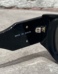 BALENCIAGA BLACK OVAL SUNGLASSES ‘BLACK/GOLD’