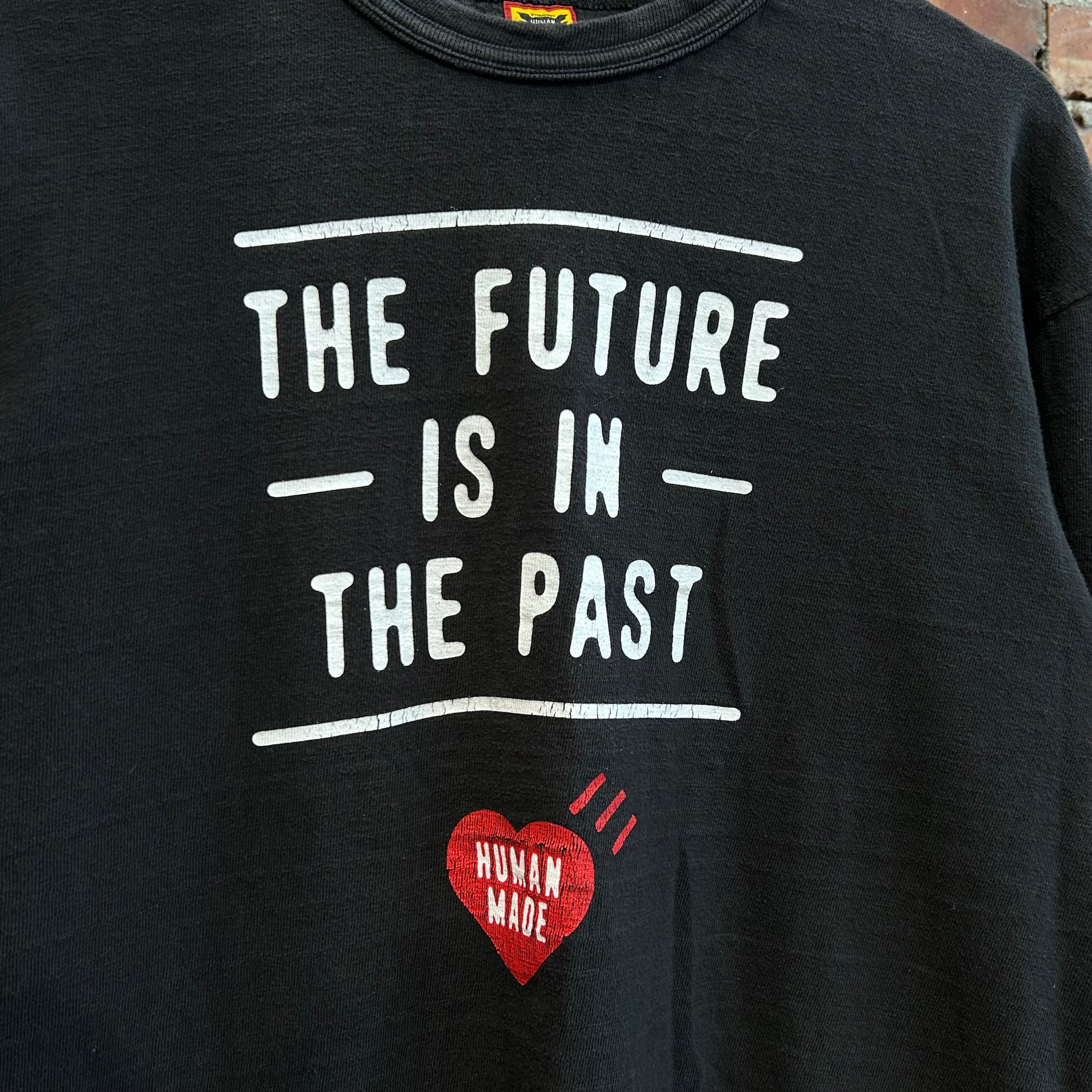 HUMAN MADE FUTURE IS IN THE PAST TEE ‘BLACK’