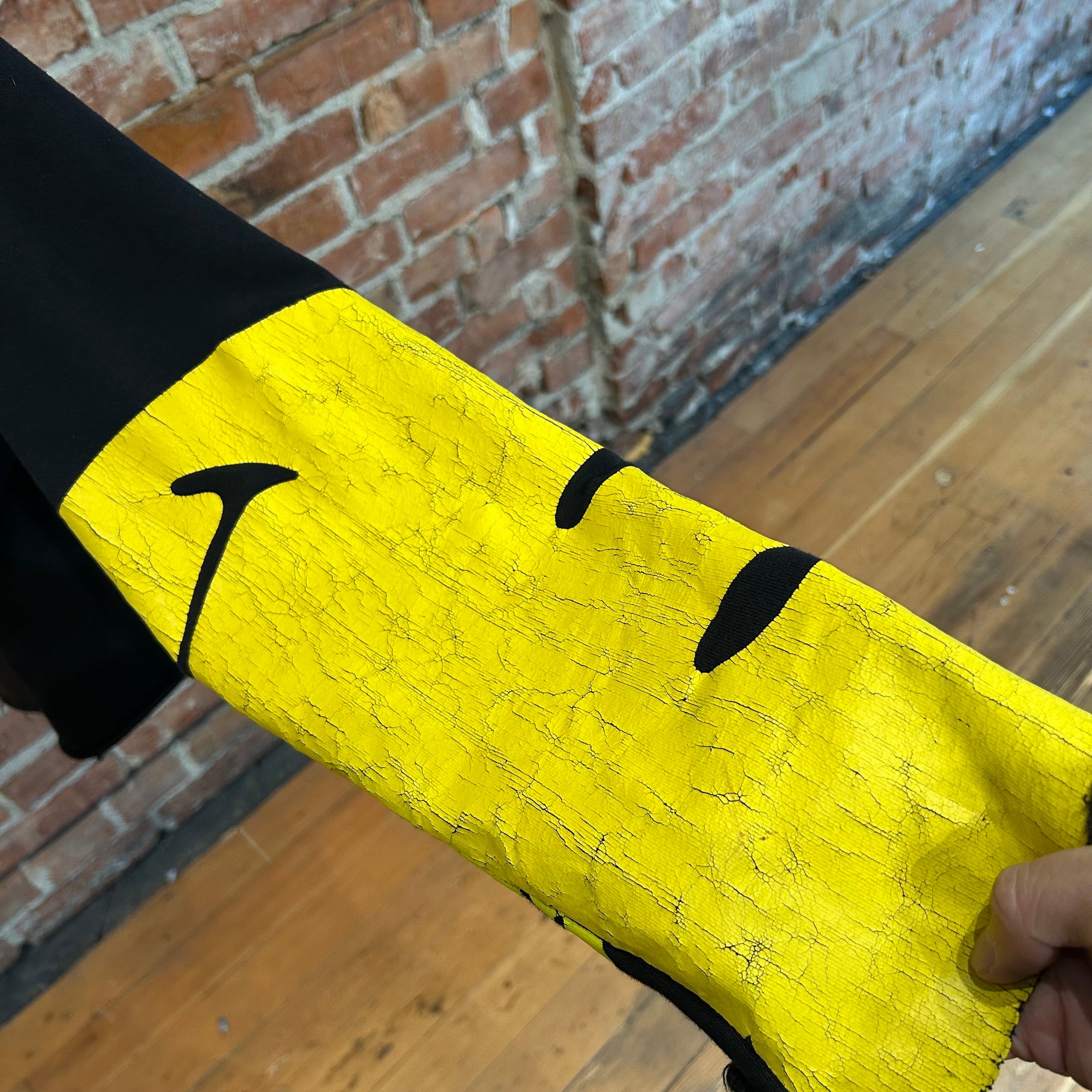 KAPITAL RECONSTRUCTED PATCHWORK SMILEY HOODIE ‘BLACK/YELLOW’