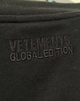 VETEMENTS AW21 THINK GLOBALLY RAINBOW TEE ‘BLACK’
