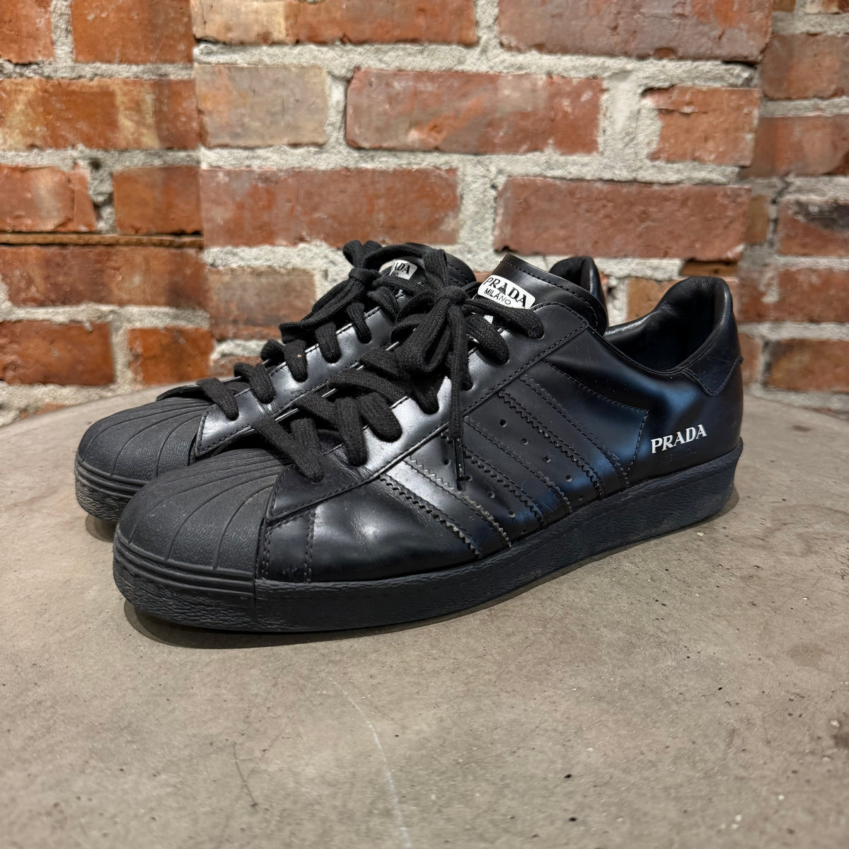 ADIDAS X PRADA MILANO LEATHER SUPERSTAR SNEAKERS ‘BLACK’