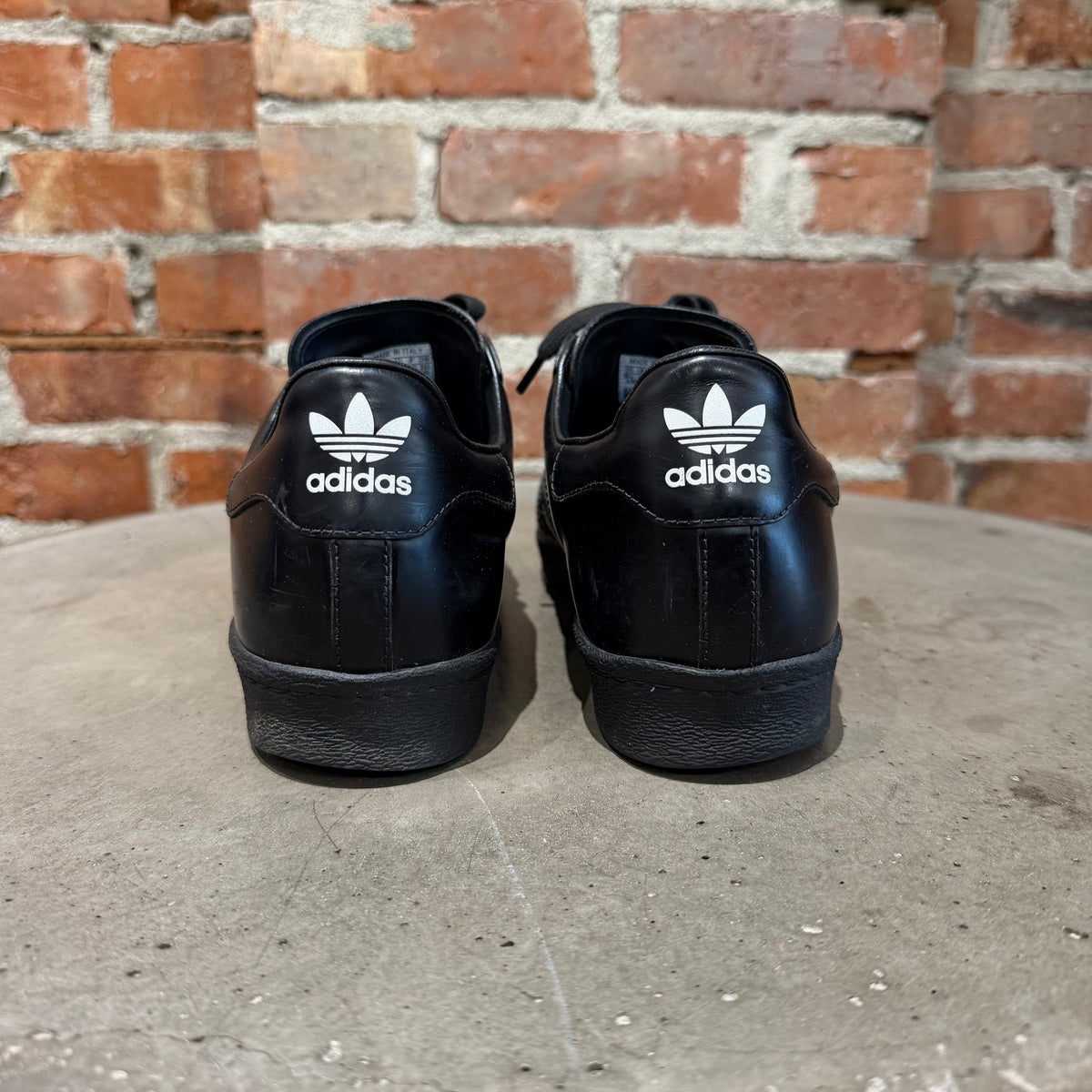 ADIDAS X PRADA MILANO LEATHER SUPERSTAR SNEAKERS ‘BLACK’