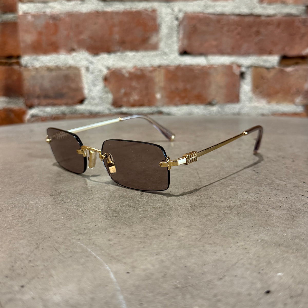 MIU MIU B50S RIMLESS SUNGLASSES ‘GOLD’