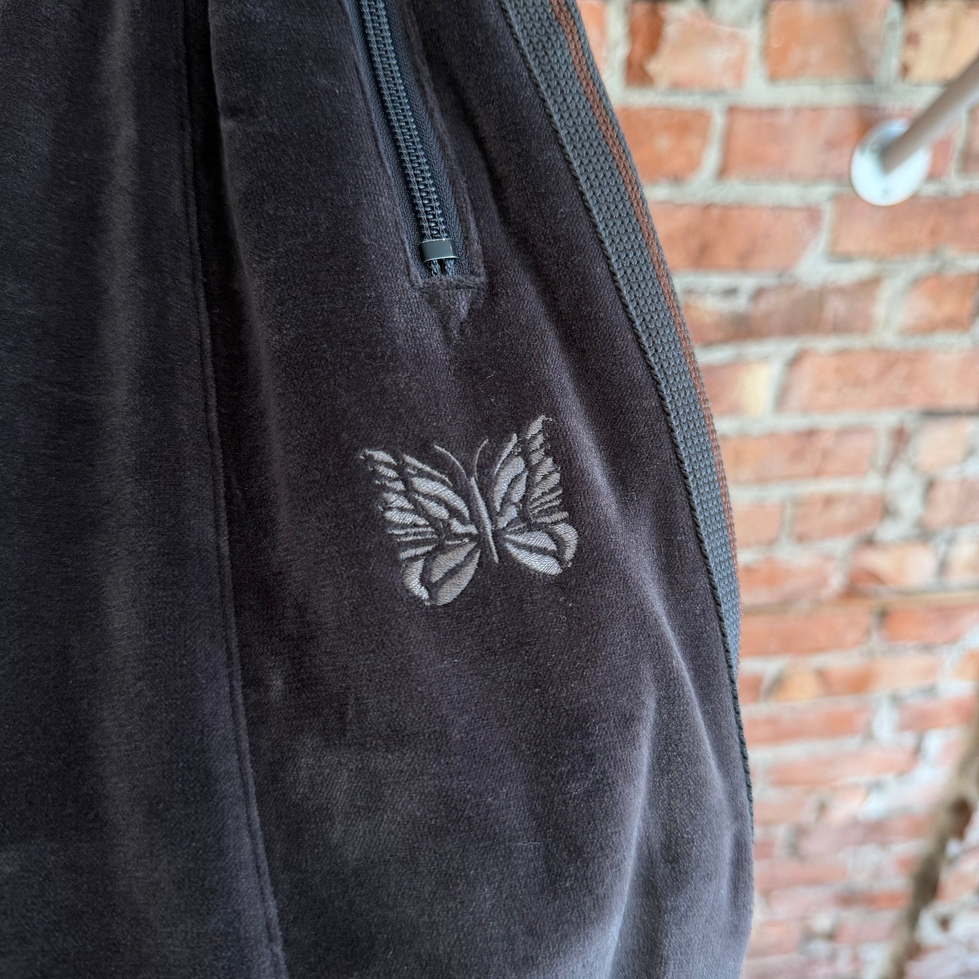 NEEDLES HD TRACK PANTS ‘DARK GRAY/COPPER’