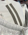 RICK OWENS SS23 EDFU DRKSHDW SHINY PUSHER PANTS ‘MILK’