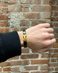HERMES CLICK BRACELET ‘GOLD/BLACK’