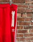 ADIDAS X JEREMY SCOTT MEGAZIP TRACK PANTS ‘RED’
