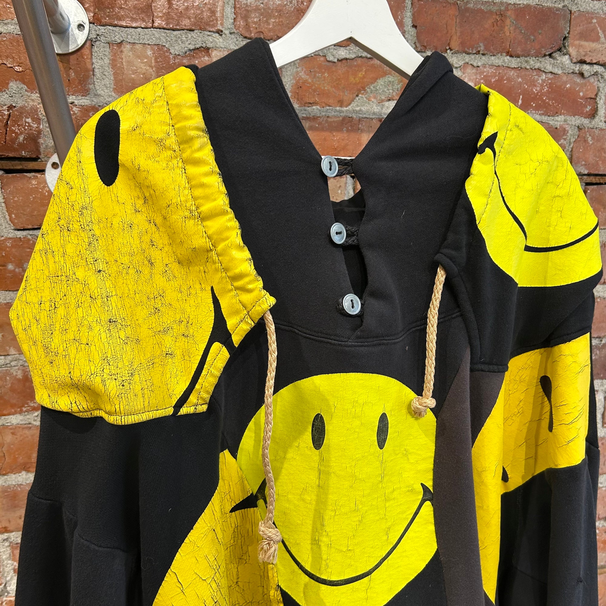 KAPITAL RECONSTRUCTED PATCHWORK SMILEY HOODIE ‘BLACK/YELLOW’