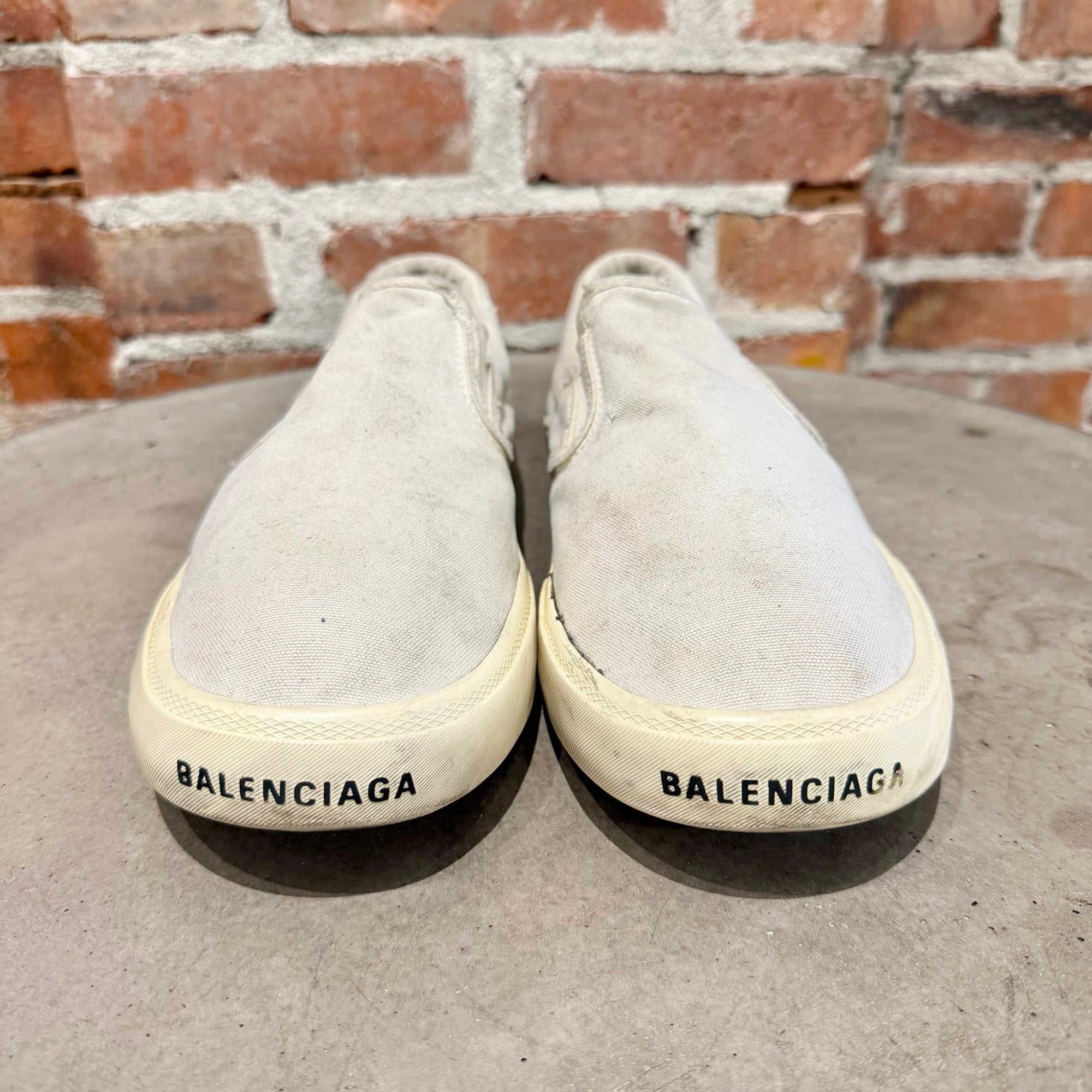 BALENCIAGA PARIS GRAFFITI SLIP ON SNEAKERS ‘WHITE’