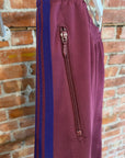 NEEDLES WIDE HD TRACK PANTS ‘MAROON/PURPLE’